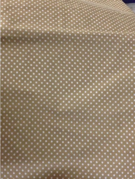 tessuto pois bianchi fondo beige